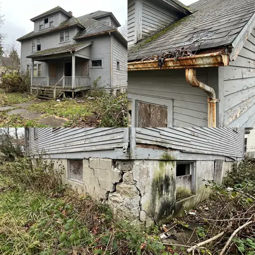 Abandoned House: Neglected Structure with Cracked Foundations