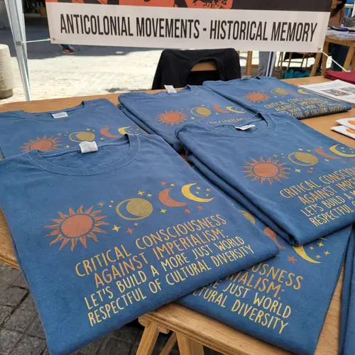 Nature Symbols T-Shirts: Sun, Moon, Stars in Warm Tones on Blue