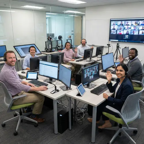 Cheerful Educators in Modern Classroom | Online Teaching Experts