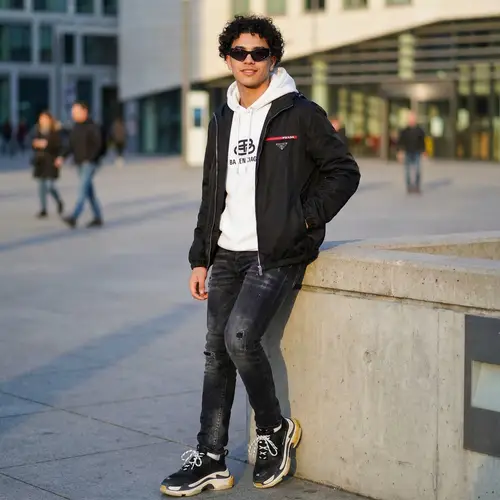 Stylish Portrait of a Young Man in Luxury Fashion