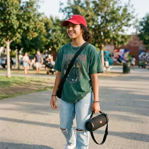 Teenage Girl with Red Cap and Speaker