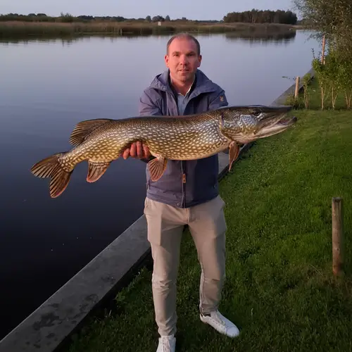 Me Holding a Huge Pike: Fishing Adventure