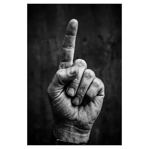 High Contrast Black and White Photography of Hand Gesture