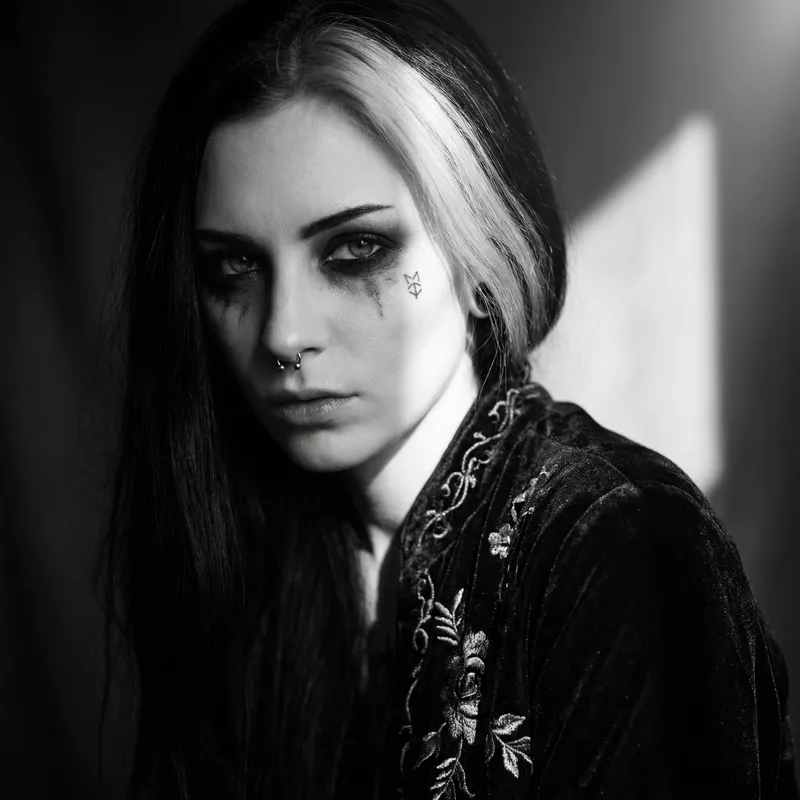 Coldly Beautiful Goth Woman with Piercing Eyes - Dark Beauty in Film Noir