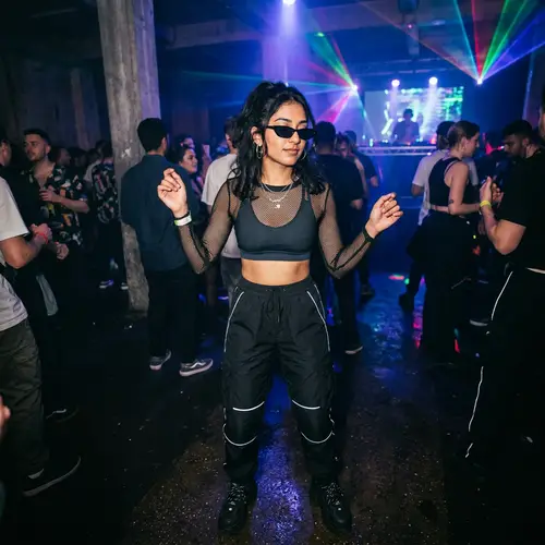 Stunning South Asian Rave Techno Girl Dancing in Underground Club