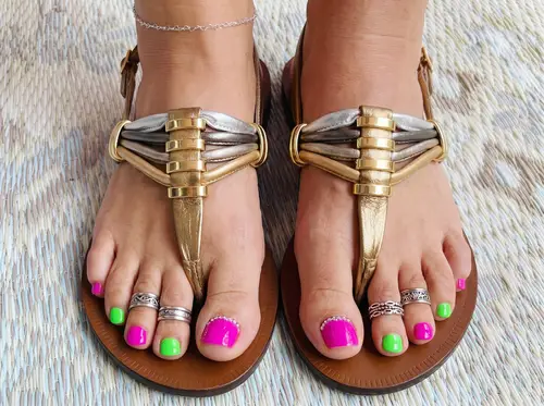 Close-Up of Women's Feet in Sandals