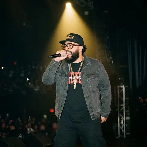 Bearded Latino Rapper Performing Energetically