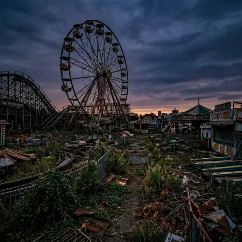 Abandoned Amusement Park at Dusk: Desolate Scenes and Forgotten Delights