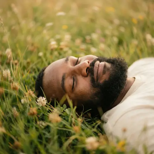 Tranquil Portrait of African American Man on Grass | Dreamlike Serenity