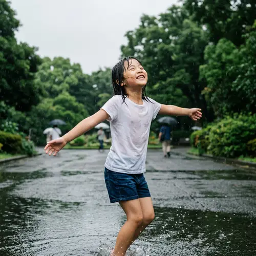 Young Asian Girl Dancing Joyously in the Rain