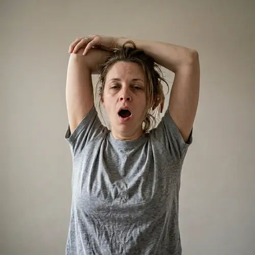 Tired Woman Stretching: Morning Routine Insights