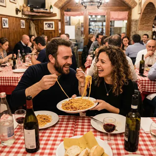 Man and Woman Eating Plate of Spaghetti