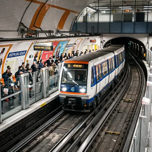 Dynamic VAL 208 Metro Train Arriving at a Station