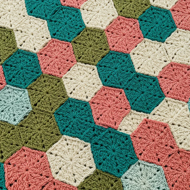 Colorful Crochet Quilt with Teal and Coral Hexagons