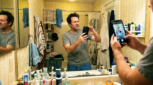 Funny Selfie in a Messy Bathroom