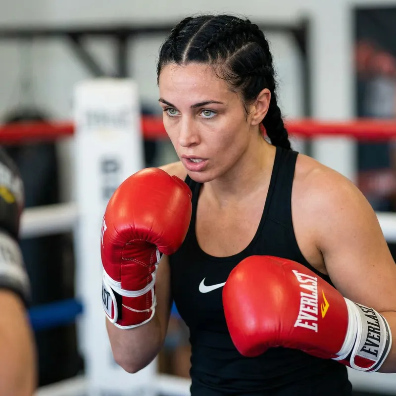 Green-Eyed Boxer Woman with Everlast Gloves