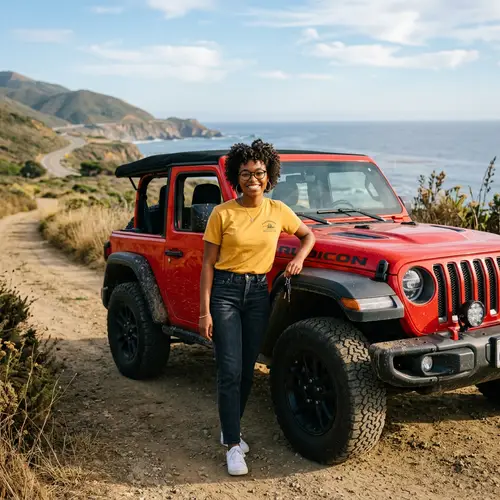 Black Girl with Glasses in a Red Jeep