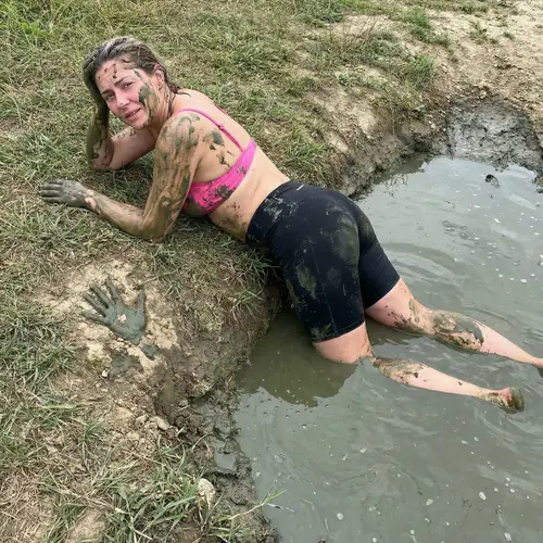 Woman Pulls Herself from Deep Mud Puddle