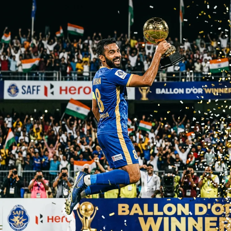 Triumphant South Asian Soccer Player with Ballon d'Or Triumphant South Asian Soccer Player with Ballon d'Or