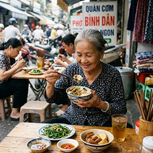 Elderly Vietnamese Woman Eating Bowl of Rice
