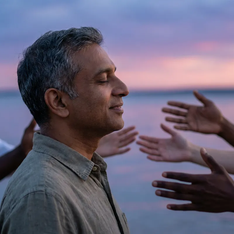 Relieved Middle-Aged Man with Diverse Supportive Hands Relieved Middle-Aged Man with Diverse Supportive Hands
