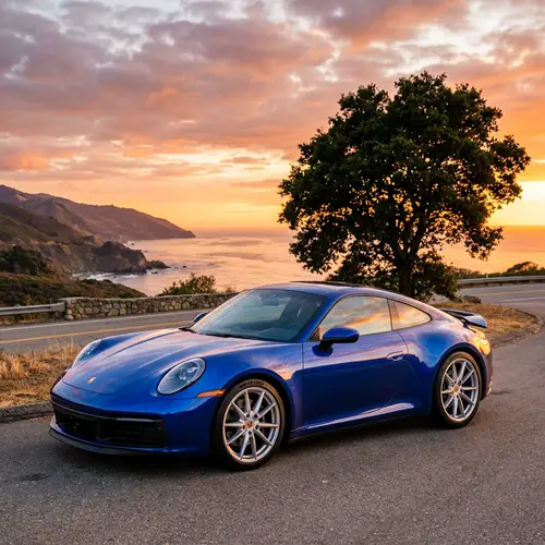 Sapphire Blue Car at Sunset | Aerodynamic Design with Silver Alloy Wheels