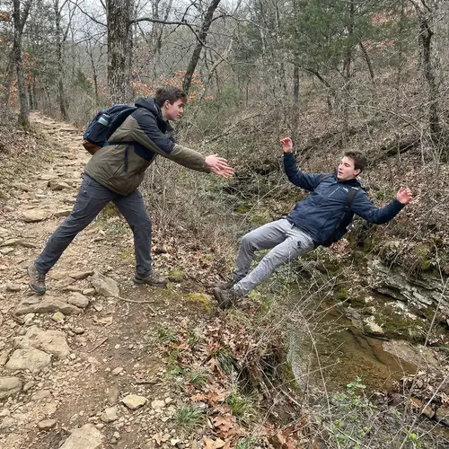Male Student Pushes Friend into Ravine