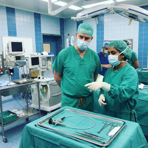 Operating Room Scene with Cystoscope and Surgeons