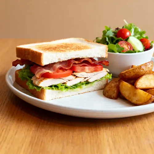 Delicious Club Sandwich with Salads and Fries