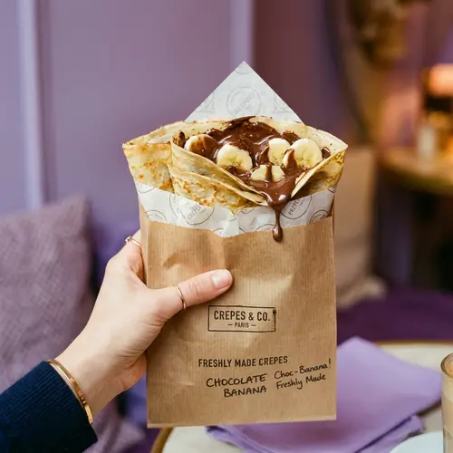 Delicious Crepes with Liquid Chocolate and Banana
