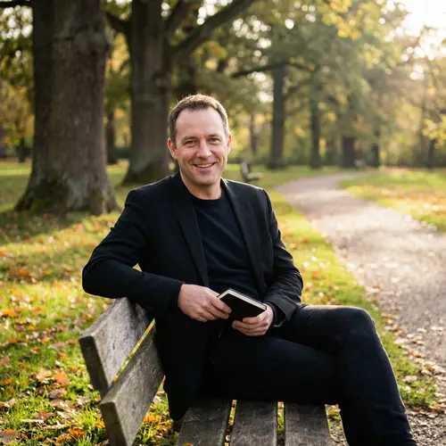 Captivating Portrait of a Man in a Tranquil Park