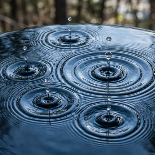 Captivating Image of Six Water Droplets Falling into Water