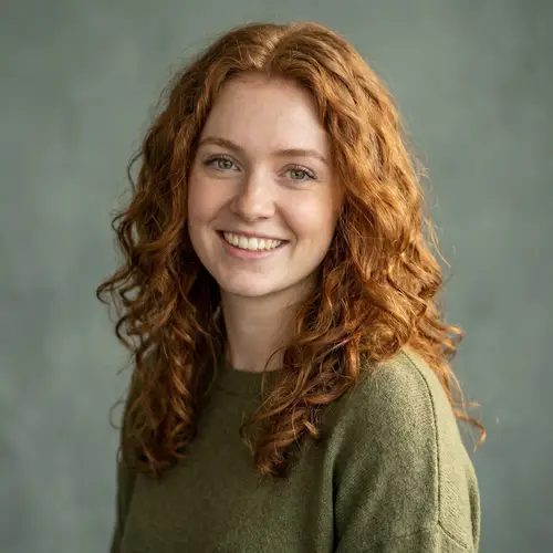 Vibrant Image of a Young Woman with Red Hair