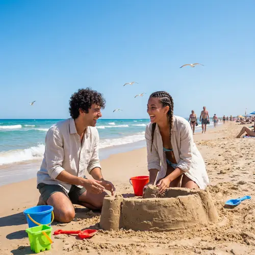 Contemporary Spanish Couple Building Sandcastle on Sunny Beach