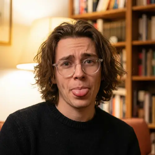 Expressive Portrait of Young Man with Glasses