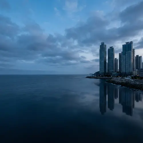 Ocean Cityscape: Upside-Down View of Convergence of Nature and Urbanization