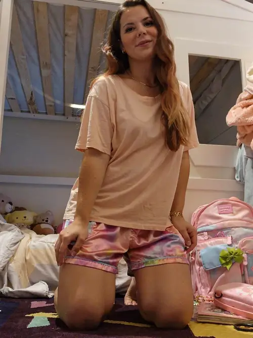 Seductive Athletic Woman in Intimate Setting