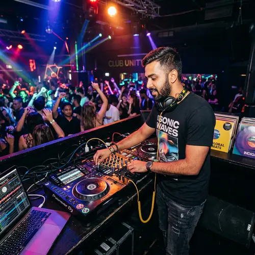 Talented South Asian DJ in Vibrant Club Environment