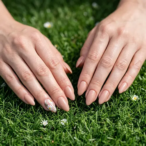 Beautiful Nude Almond Gel Nails with Floral Design