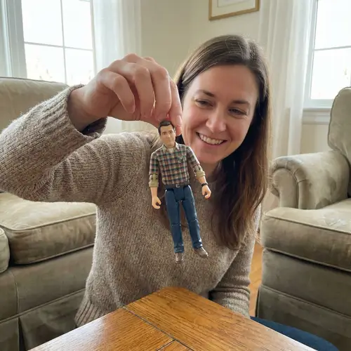 Playful Interaction: Woman Holding Toy Hispanic Man