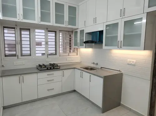 Modern White Modular Kitchen with Glass Cabinets