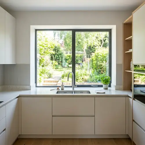 Modern Kitchen with Large Window and Clean Design