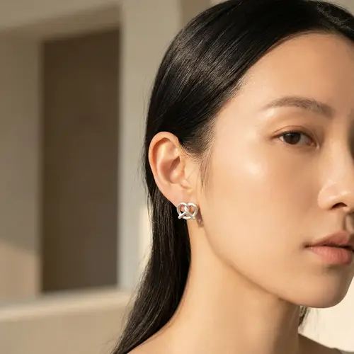 Elegant Silver Pretzel Stud Earrings for Luxury Style