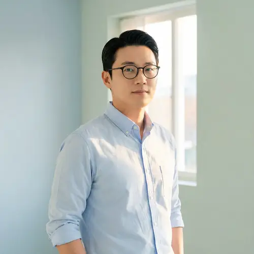 Modern East Asian Man in Stylish Shirt & Glasses