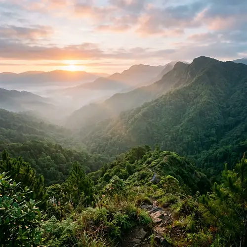 Tranquil Sunrise Over Lush Mountain Range - Peaceful Landscape View