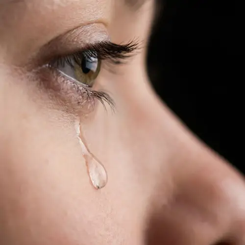 Captivating Teardrop on Dark Background