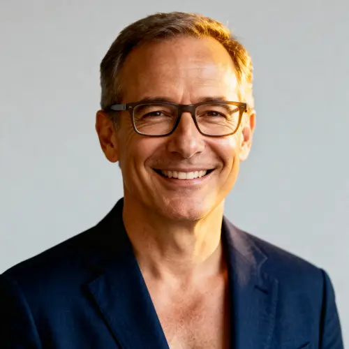 Happy Middle-Aged Man in Blazer with Glasses