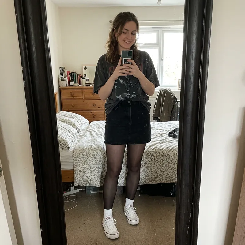 Stylish Mirror Selfie in Mini Skirt and Sneakers