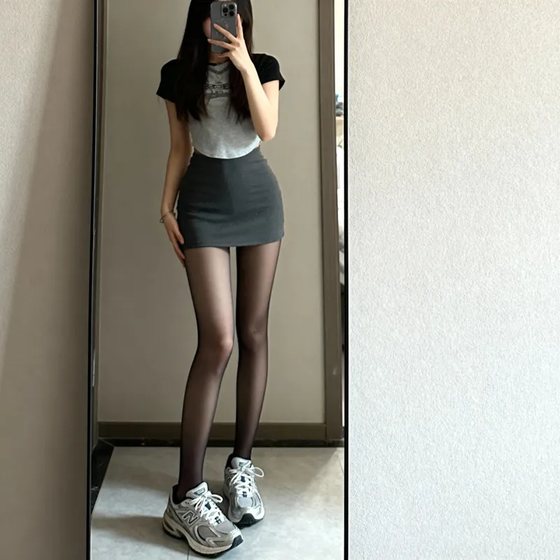 Stylish Mirror Selfie in Mini Skirt and Sneakers