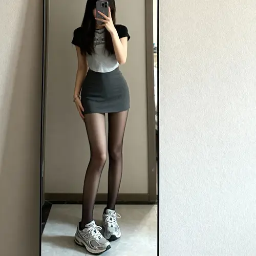 Stylish Mirror Selfie in Mini Skirt and Sneakers